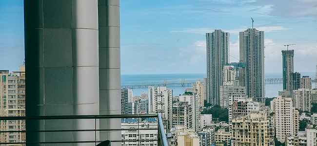 Mumbai India_City Skyline of Mumbai, India viewed from a balcony, featured in Mondrian’s Emerging Markets Investment Outlook.
